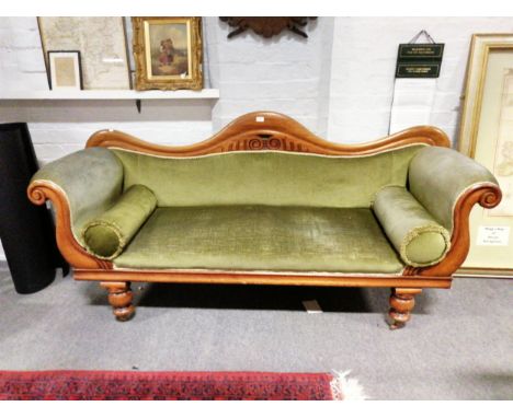 A Victorian mahogany scroll end sofa, upholstered in green dralon, turned legs, length 201cm.