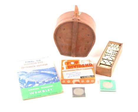 A horseshoe collar box, a lighter, a box of bone dominos, a small collection of commemorative coins, a vintage car tyre press