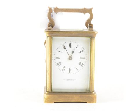 Brass cased carriage clock, signed Curtis &amp; Horspool, Leicester, 12cm.