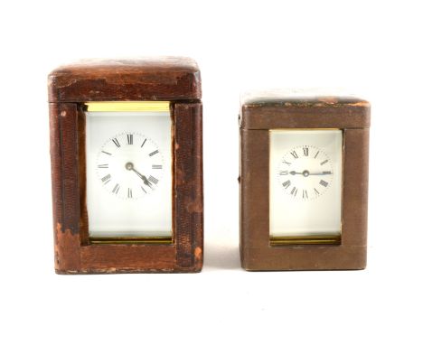 Two carriage clocks with travel cases, French movements, both with white enamel dials and Roman numerals to the chapter rings