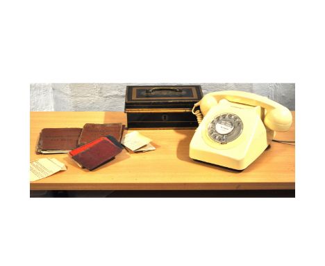 A collection of ephemera - stamps, vintage driving licences, Bruce Bairnsfather book, cream telephone, cutlery
