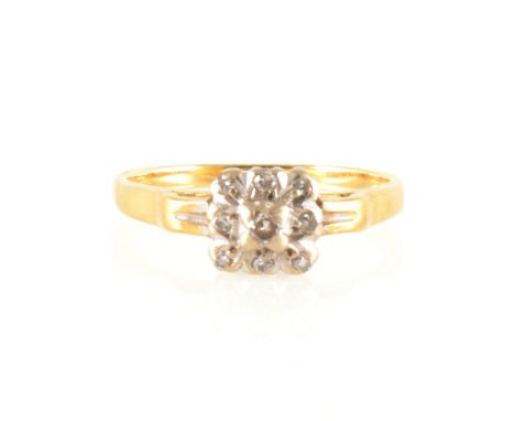 A square diamond cluster ring, nine 8 cut diamonds illusion set in a yellow and white gold mount with ridged shoulders, shank