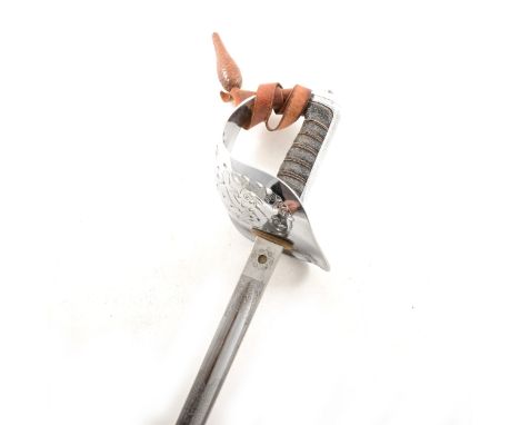 George VI Infantry Officers sword, in a field scabbard.