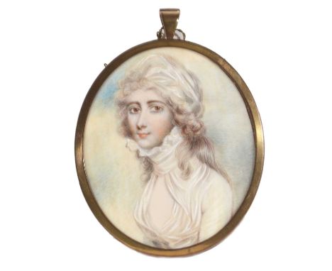 Manner of Richard Cosway - Portrait of a lady in a lace cap, watercolour on ivory, 7 x 6cms, in yellow metal frame.