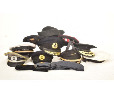 A collection of approximately twelve re-enactment WWII &amp; later Military RAF / Navy Army Officers peak hat visors. To incl