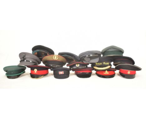 A collection of approximately sixteen re-enactment assorted Army Officers peak hat visors. To include examples with&nbsp;cap 