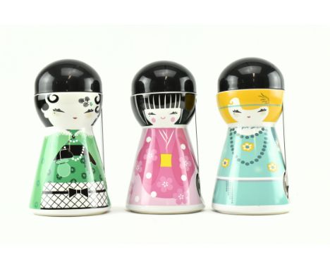 A collection of three vintage Japanese style but likely continental lidded ceramic jars. Each jar in the form of a lady, one 