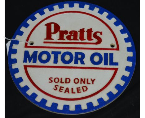 A reproduction cast iron Pratts oil plaque 