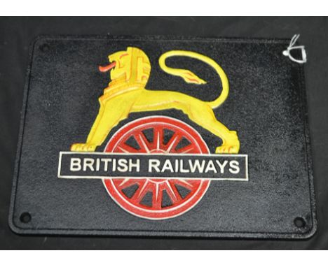 A reproduction cast iron British railway lion plaque 