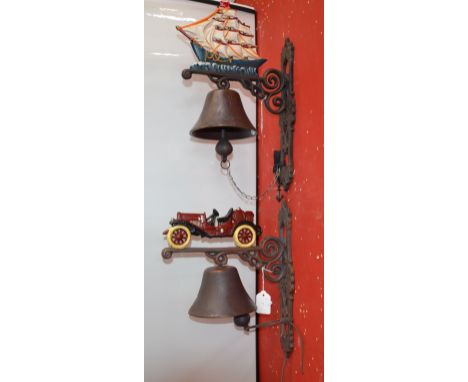Two reproduction cast metal wall mounted bells - ship pediment and automobile pediment.