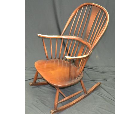 An Ercol style spindle back rocking chair.