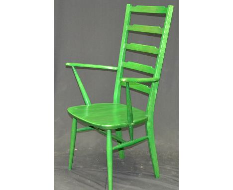 A green Ercol ladder back chair