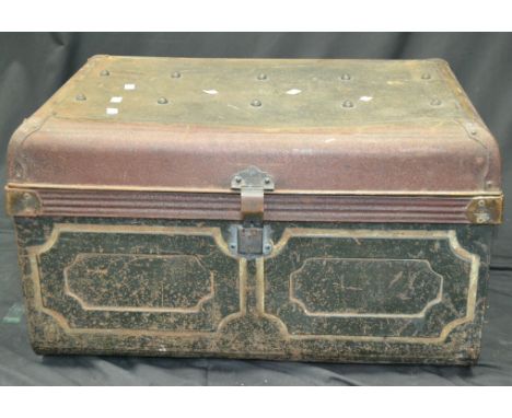 Vintage luggage - a tin trunk.