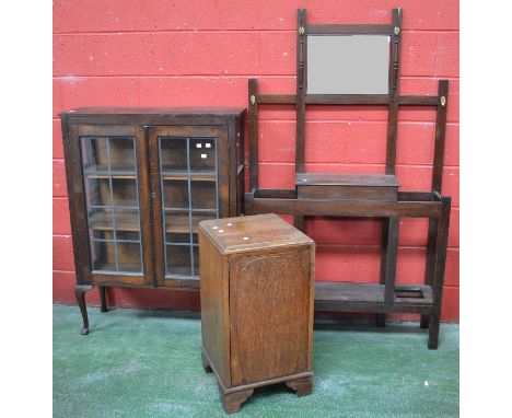 An oak display case, lead glazed doors, cabriole legs, club feet, circa 1940. 124cm high x 92cm wide x 30cm deep;  a 1940's o