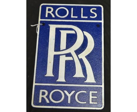 A cast metal reproduction Rolls Royce wall plaque 