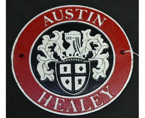 A reproduction cast iron Austin Healey plaque 