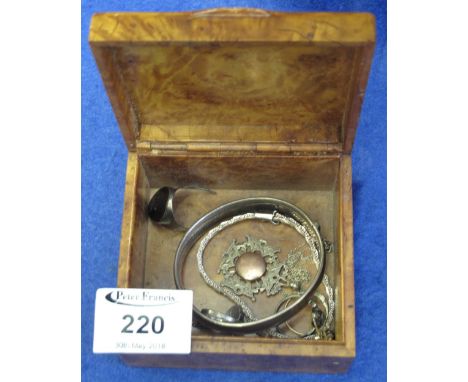 Walnut finish box containing assorted jewellery to include: silver bangle; silver rings; silver fob etc.(B.P. 24% incl. VAT)