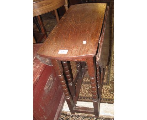 19th Century oak gate legged table with bobbin turned supports.(B.P. 24% incl. VAT)