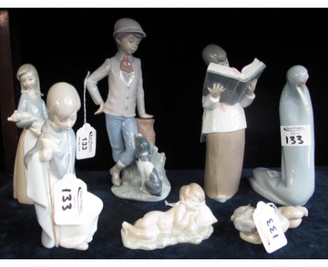 Six Lladro Spanish porcelain figurines, various, together with Nao Spanish porcelain figure group of a young boy and dog. (7)