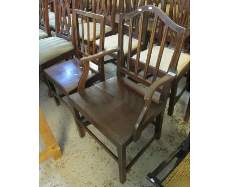 19th Century oak farmhouse stick back open armchair, together with a 19th Century oak farmhouse stick back kitchen chair. (2)