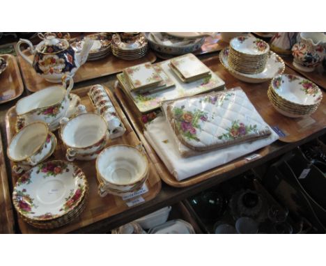 Three trays of Royal Albert bone china 'Old Country Roses' dinnerware and other items to include: two handled bowls and sauce