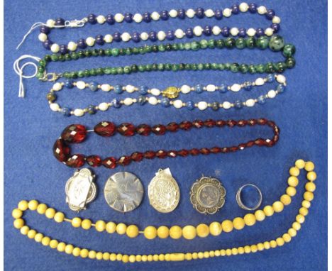 Plastic box containing assorted jewellery including a Mizpah ring; ivory graduated, beaded necklace; other necklaces; costume