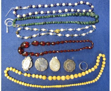 Plastic box containing assorted jewellery including a Mizpah ring; ivory graduated, beaded necklace; other necklaces; costume