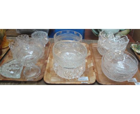 Two trays of heavy lead crystal and cut glass fruit bowls, some with star cut bases and other patterns, together with tray of