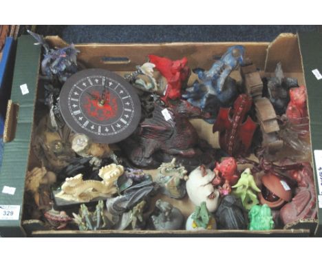 Box of modern dragon figurines, some ceramic, glass and metal. Together with a slate clock with Welsh dragon design. (B.P. 24