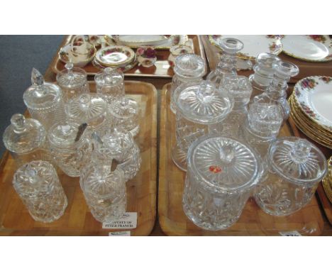 Two trays of cut glass items to include: decanters and stoppers; Bohemia jar and cover; hobnail cut trinket boxes and cover; 