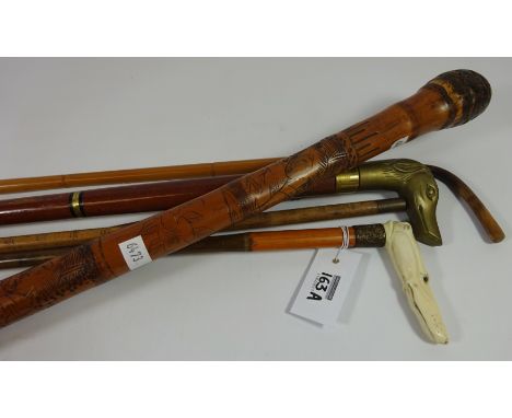 Early 20th Century walking stick with carved ivory dog's head handle, Chinese bamboo walking stick / cosh and other walking s