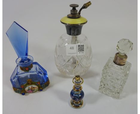 Cut crystal atomizer with white metal and enamel top, stamped sterling silver and three other scent bottles   Condition Repor