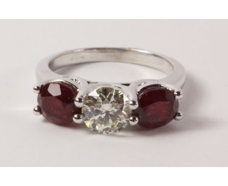 Three stone brilliant cut diamond and ruby white gold ring hallmarked 18ct (diamond approx 1 carat and rubies 2.5 carats)   C