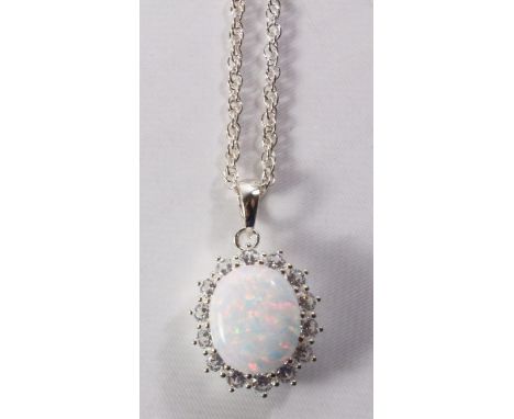 Opal pendant necklace on fancy link chain stamped 925   Condition Report   Click here for further images, condition, auction 