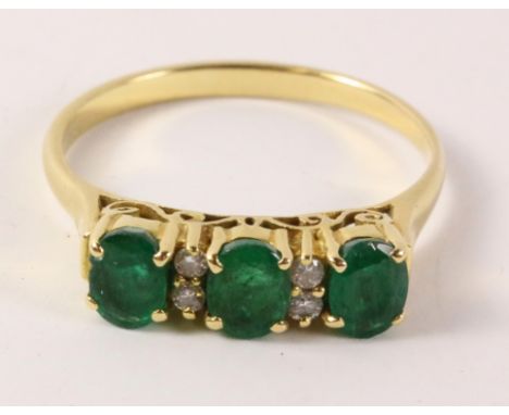 Emerald and diamond ring stamped 18k   Condition Report   Click here for further images, condition, auction times & delivery 