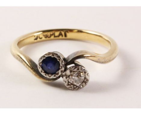 Sapphire and diamond cross-over ring stamped 18ctplat   Condition Report   Click here for further images, condition, auction 