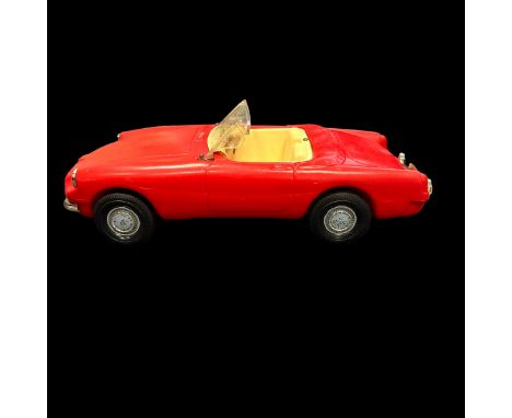 Sindy 1960s MGB red convertible car, generally excellent except deformed plastic windscreen. Contents unchecked for completen
