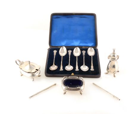 A set of six silver teaspoons by Henry Matthews, Birmingham 1894, cased, a a three piece condiment set by Walker &amp; Hall, 