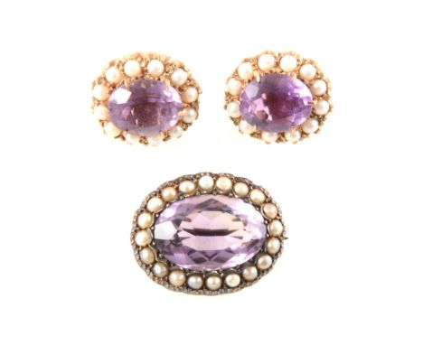 An amethyst and seed pearl oval brooch and pair of similar earrings for pierced ears, brooch 20mm x 15mm, earrings 15mm x 12m