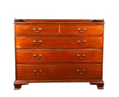 A Victorian mahogany chest of drawers, three-quarter gallery two short and three long graduating drawers, ogee bracket feet, 