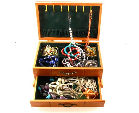 A wooden jewel box of natural stone and freshwater pearl necklaces and bracelets, citrine, malachite, aventurine quartz, shel