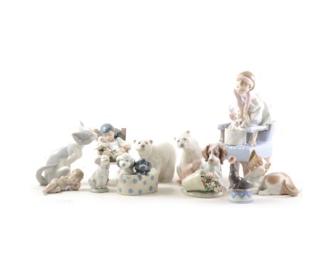 Nine Lladro figures including Purrfect Friends, 6512 with box, It Wasn't Me, 7276 with box, plus two polar bears, two cats, p