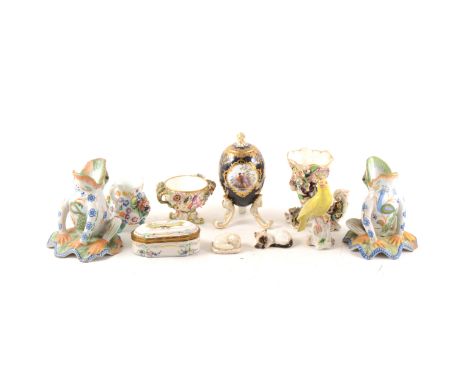 A quantity of British and Continental porcelain and pottery, including Derby style cornucopia vase, 18cm, Pearlware style bus