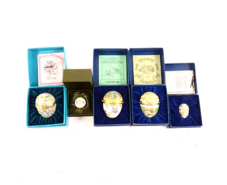 Eleven Bilston &amp; Battersea/Halcyon Days enamel boxes, Christman boxes, five in the form of Easter Eggs and one other.