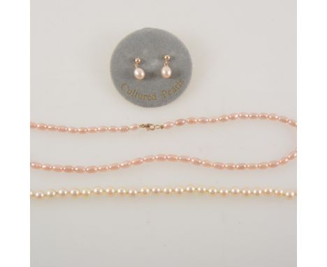 A cultured pearl necklace and another pearl necklace with matching earrings, the necklace having seventy-six 6.5mm cultured p