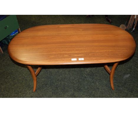 Ercol elm rectangular coffee table on sabre supports
