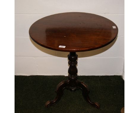 Circular mahogany lamp table on tri-pod base