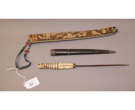 A decorative late 19th / early 20th century Japanese bladed dagger, with a carved bone grip, a bamboo-lined leather scabbard 