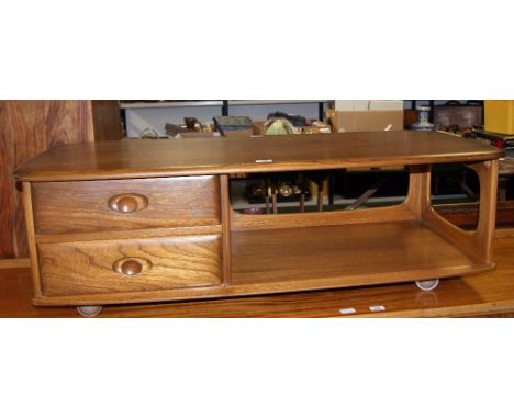 Ercol elm rectangular Pandora's Box fitted coffee table on shepherd castors 