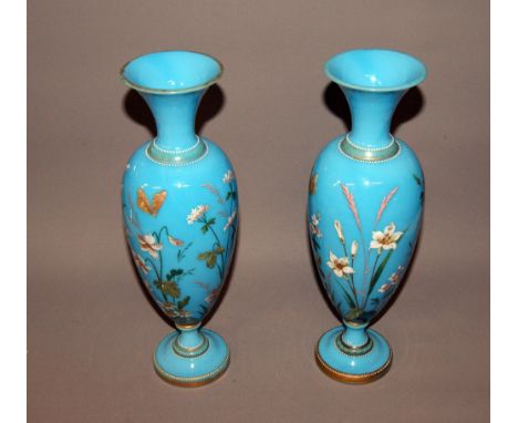 A pair of enamelled and painted continental blue glass vases, botanical decoration with birds  CONDITION REPORT; Each vase me